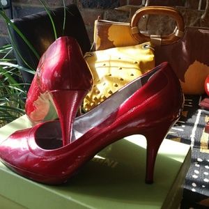 Peep toe red patent leather pump